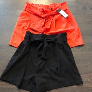 Dynamite paper bag shorts, elastic waist, smooth material and never worn!